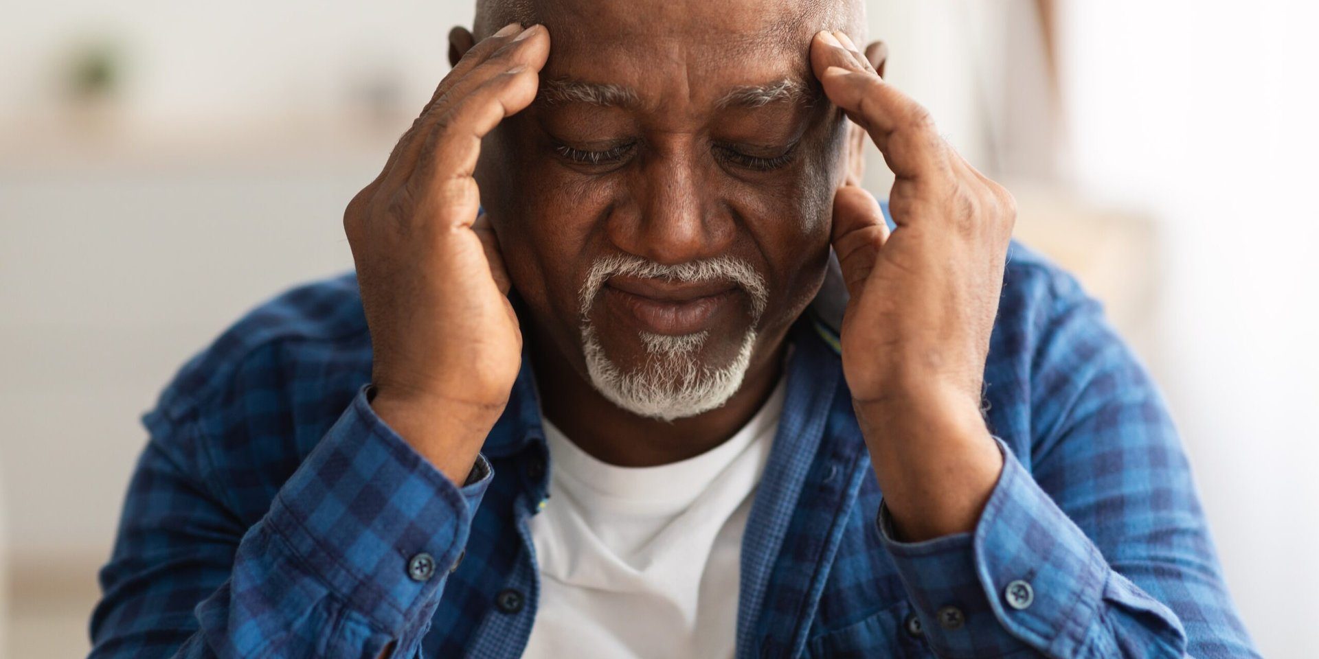 Headache.,Senior,African,American,Man,Suffering,From,Migraine,Pain,Massaging