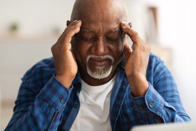 Headache.,Senior,African,American,Man,Suffering,From,Migraine,Pain,Massaging