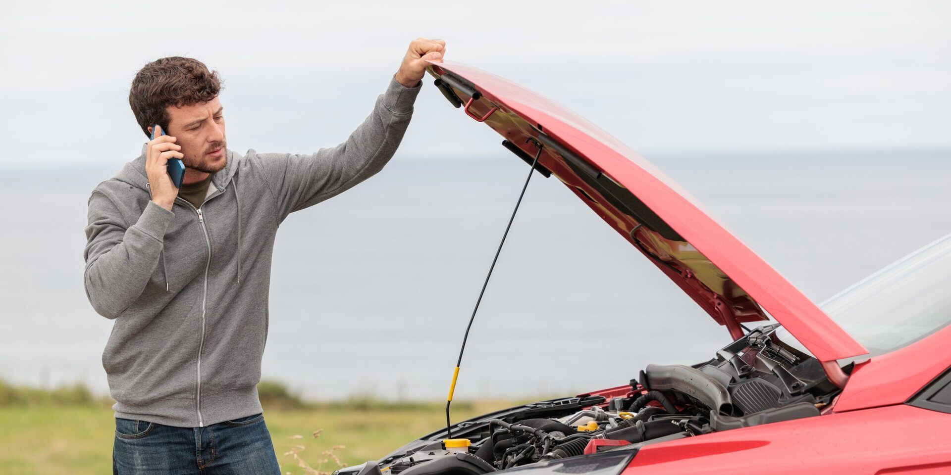 Displeased,Man,Breaks,Down,Car,In,The,Middle,Of,Trip