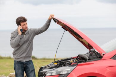 Displeased,Man,Breaks,Down,Car,In,The,Middle,Of,Trip