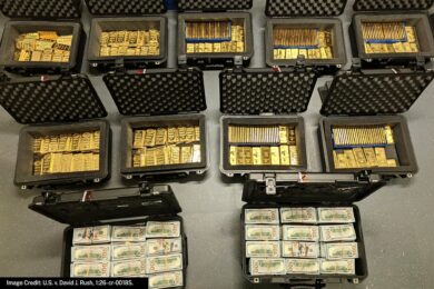 Cash and gold bars recovered when the FBI searched the residence of David Rush, 49, of Ashburn, Virginia. Rush, a former federal executive, pleaded guilty on Oct. 6, 2026, to defrauding the federal government out of nearly $194 million in government funds,